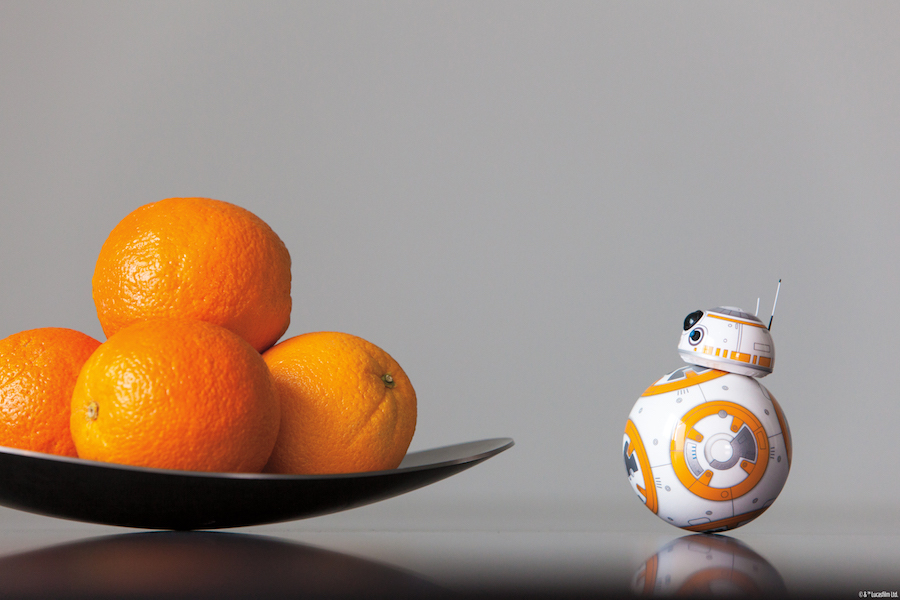 Sphero Star Wars BB-8 staring at a bowl of Oranges